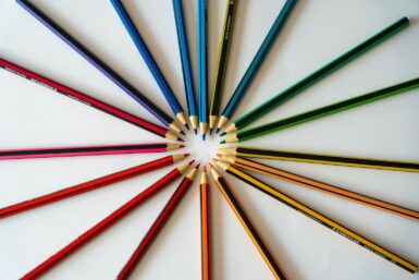 blue red green and yellow colored pencils